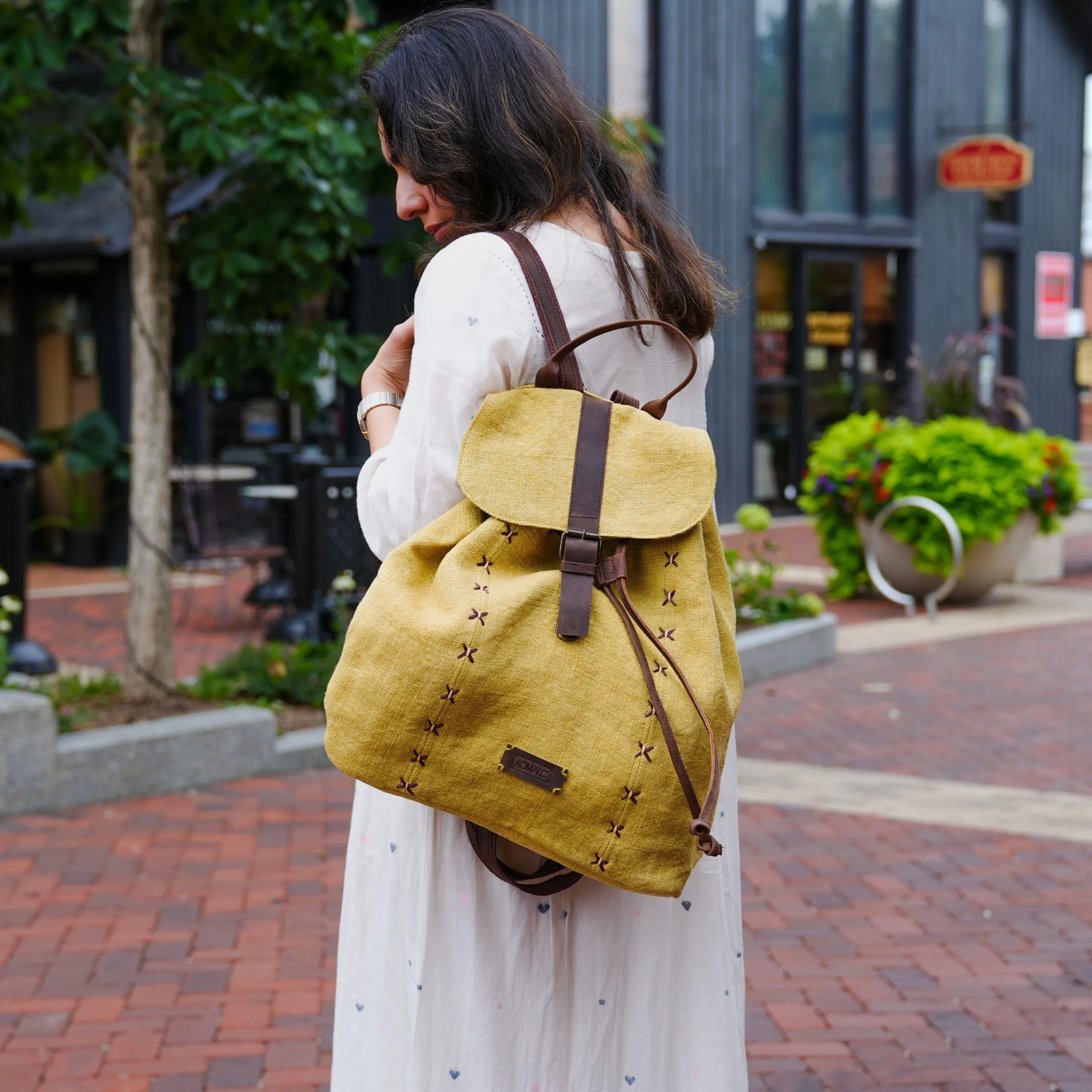 KomalC backpack for Women and Men, made with high-quality Jute & Premium Buffalo Leather accents- Stylish, Eco-friendly & spacious design for everyday use | college travel (Sunflower)